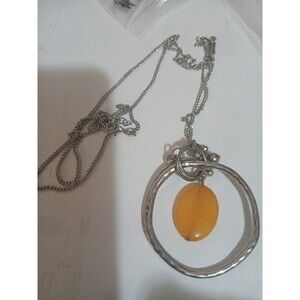 Circle Charm With a Yellow Bead In It Chain Is 18 Inch With 2 In Extension
